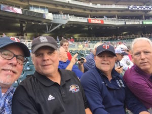 Four guys at a ballgame...